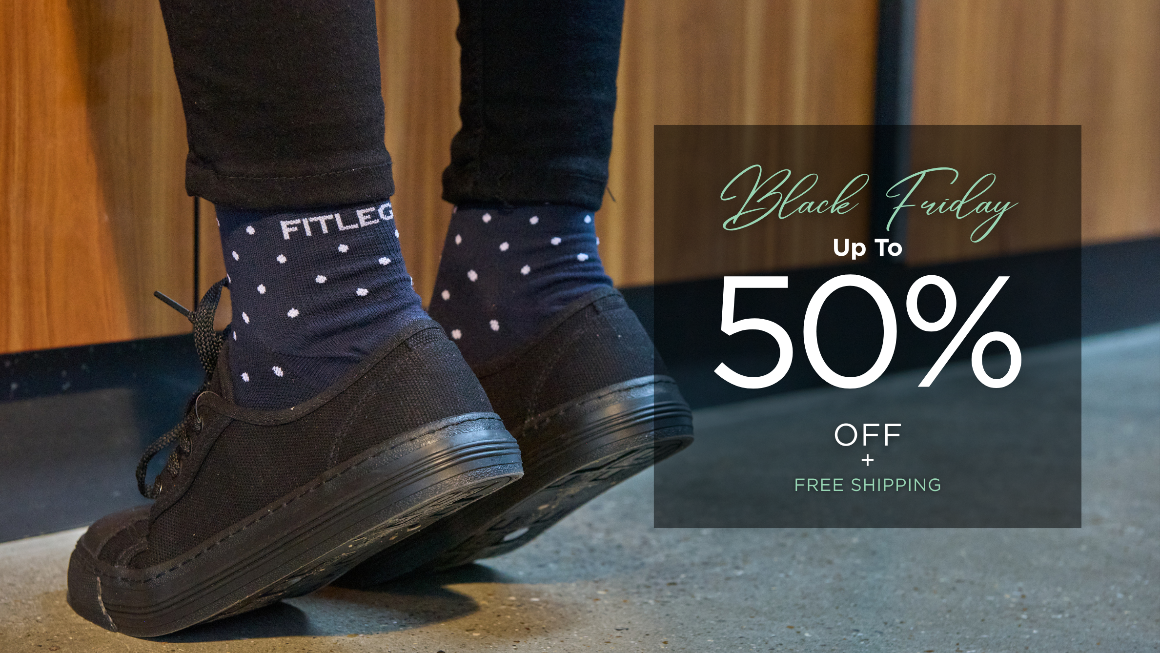 Banner promoting the FITLEGS Compression Socks Black Friday Sale with discounted pricing highlighted with polka dot socks. 